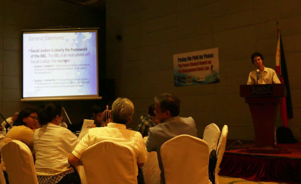 "Social justice is the BBL's framework" Francis Dee, executive assistant to former Ambassador Howard Dee, presents the Social Justice and Human Development Cluster's findings. The forum is the first public presentation of the Peace Council's report on the draft Bangsamoro Basic Law. Photo by Luis Adrian A. Hidalgo.